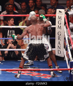 Las Vegas, Nevada, USA. 12th Sep, 2015. Champion Floyd Mayweather jr and challenger Andre Berto engage each other during their WBA AND wbc World Welter weight title match on September 12, 2015 at MGM Grand Arena in Las Vegas, Nevada. Mayweather won via unanimous decision, making his record 49-0 and tying the record of former Heavyweight champion Rocky Marciano. Credit:  Marcel Thomas/ZUMA Wire/Alamy Live News Stock Photo