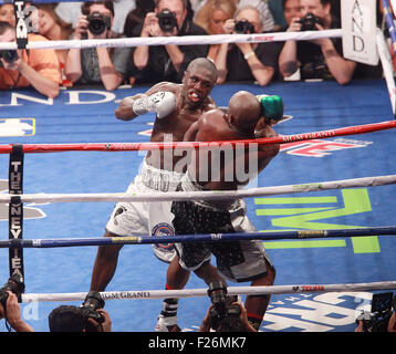 Las Vegas, Nevada, USA. 12th Sep, 2015. Champion Floyd Mayweather jr and challenger Andre Berto engage each other during their WBA AND wbc World Welter weight title match on September 12, 2015 at MGM Grand Arena in Las Vegas, Nevada. Mayweather won via unanimous decision, making his record 49-0 and tying the record of former Heavyweight champion Rocky Marciano. Credit:  Marcel Thomas/ZUMA Wire/Alamy Live News Stock Photo