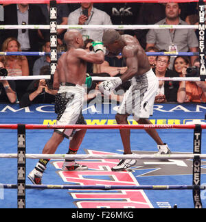 Las Vegas, Nevada, USA. 12th Sep, 2015. Champion Floyd Mayweather jr and challenger Andre Berto engage each other during their WBA AND wbc World Welter weight title match on September 12, 2015 at MGM Grand Arena in Las Vegas, Nevada. Mayweather won via unanimous decision, making his record 49-0 and tying the record of former Heavyweight champion Rocky Marciano. Credit:  Marcel Thomas/ZUMA Wire/Alamy Live News Stock Photo