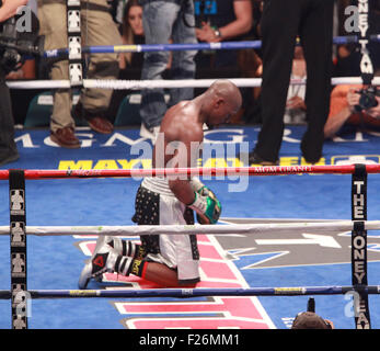 Las Vegas, Nevada, USA. 12th Sep, 2015. Champion Floyd Mayweather jr and challenger Andre Berto engage each other during their WBA AND wbc World Welter weight title match on September 12, 2015 at MGM Grand Arena in Las Vegas, Nevada. Mayweather won via unanimous decision, making his record 49-0 and tying the record of former Heavyweight champion Rocky Marciano. Credit:  Marcel Thomas/ZUMA Wire/Alamy Live News Stock Photo