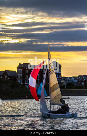 Southport, Merseyside, UK. 13th September, 2015. The Southport 24 Hour yachting Race is a national sailing endurance event for two-handed sailing dinghies, with 63 Firefly, Lark, Enterprise and GP 14 boats competing. The race, hosted by the West Lancs Yacht Club, has a long history and is usually held in September. The race starts at 12 noon on the Saturday. The contestants then race their dinghies around the marine lake finishing at noon today.  During the hours of darkness, the helm and crew of each dinghy must keep a careful watch for other boats (often capsized). Stock Photo