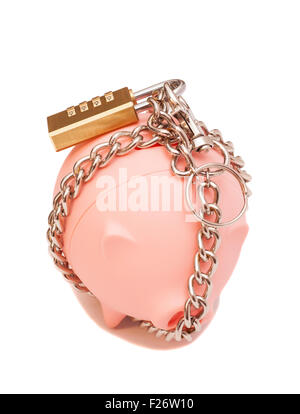 Piggy bank padlocked with chains and padlock on white background Stock Photo