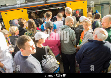 Great North Run competitors attempt to board trains at East Boldon Metro Station, Tyne & Wear, UK on 13th September 2015 Stock Photo