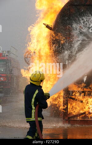 fire fighter at large incident Stock Photo