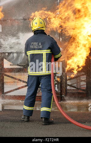 fire fighter at large incident Stock Photo