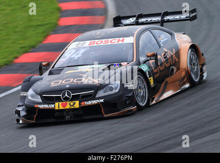 Oschersleben, Germany. 13th Sep, 2015. DTM frontrunner Pascal Wehrlein drives his Mercedes during the DTM German Touring Car Championship in the etropolis arena in Oschersleben, Germany, 13 September 2015. PHOTO: JENS WOLF/DPA/Alamy Live News Stock Photo