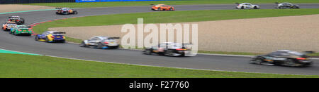 Oschersleben, Germany. 13th Sep, 2015. DTM drivers drive close to eachother after the starting signal during the DTM German Touring Car Championship in the etropolis arena in Oschersleben, Germany, 13 September 2015. PHOTO: JENS WOLF/DPA/Alamy Live News