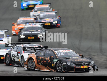 Oschersleben, Germany. 13th Sep, 2015. DTM frontrunner Pascal Wehrlein drives his Mercedes during the DTM German Touring Car Championship in the etropolis arena in Oschersleben, Germany, 13 September 2015. PHOTO: JENS WOLF/DPA/Alamy Live News Stock Photo