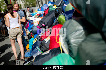 Munich, Germany. 12th Sep, 2015. Many donated sleeping bags are collected close to the train station in Munich, Germany, 12 September 2015. Due to a lack of refugee shelters, volunteers ask for donated sleeping bags and mats. Photo: Sven Hoppe/dpa/Alamy Live News Stock Photo