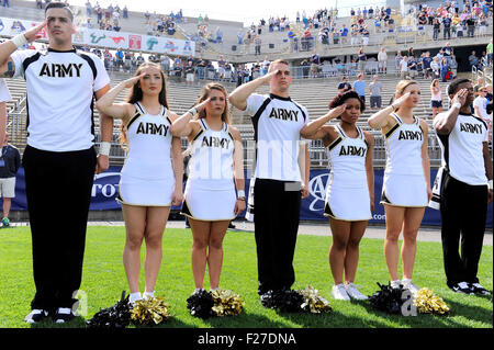 September 12, 2015: Army Black Knights cheerleaders salute during the playing of the national anthem at the NCAA football game between the Army Black Knights and the Connecticut Huskies held at Pratt & Whitney Stadium Stadium at Rentschler Field in East Hartford Connecticut. The Connecticut Huskies defeated the Army Black Knights 22-17. Eric Canha/CSM Stock Photo