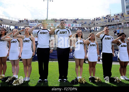 September 12, 2015: Army Black Knights cheerleaders salute during the playing of the national anthem at the NCAA football game between the Army Black Knights and the Connecticut Huskies held at Pratt & Whitney Stadium Stadium at Rentschler Field in East Hartford Connecticut. The Connecticut Huskies defeated the Army Black Knights 22-17. Eric Canha/CSM Stock Photo