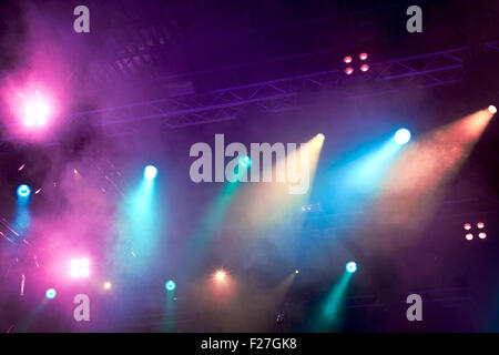 Various blue and pink stage lights in the dark Stock Photo