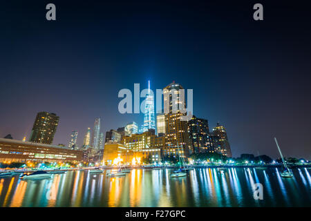 The Lower Manhattan skyline at night seen from Pier 25, at Hudson River Park, in Manhattan, New York. Stock Photo