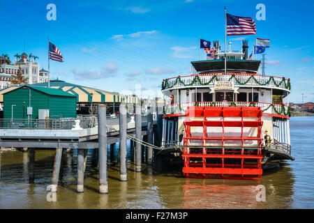 The beloved Natchez Steamboat at it's Boarding Dock on the Mississippi River near the French Quarter in New Orleans, LA Stock Photo