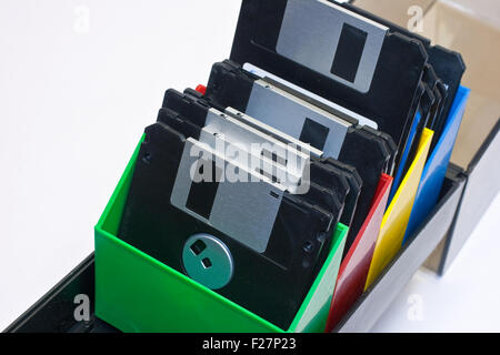 Floppy disk in a box container. White background Stock Photo