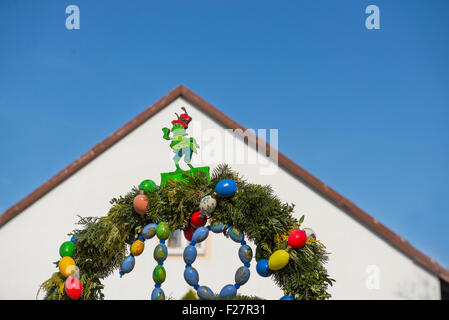 House decorated with wreath and easter eggs in festival of easter Stock Photo