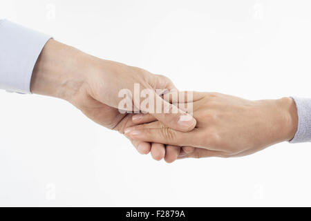 Close-up of man holding woman's hand, Bavaria, Germany Stock Photo