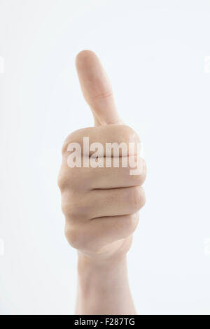 Close-up of a woman's hand giving thumbs up, Bavaria, Germany Stock Photo