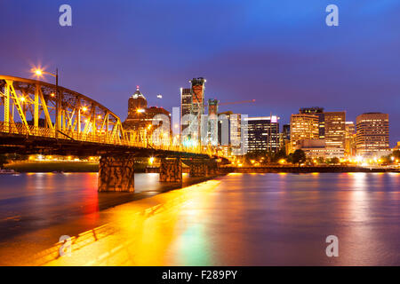 The skyline of Portland, Oregon at night. Photographed from across the Willamette River. Stock Photo