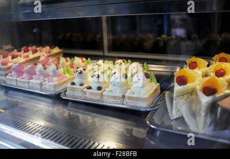 London UK - Typical Chinese bakery window in Chinatown Stock Photo