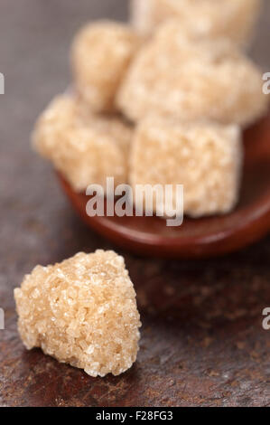 Brown sugar pieces, close up shot, local focus Stock Photo