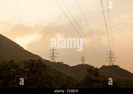 Power lines in hong kong back country Stock Photo