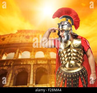 Roman legionary soldier in front of coliseum Stock Photo