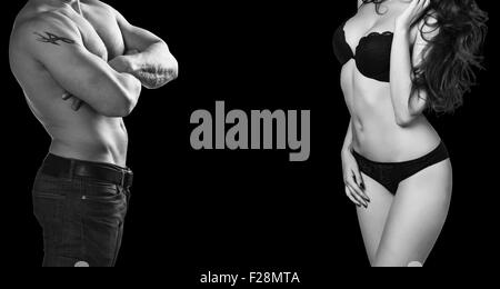Man and woman's bodies isolated on a black background Stock Photo