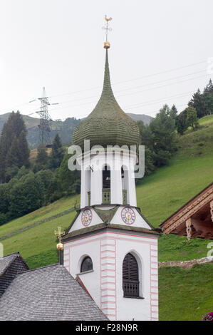 Austria, Tyrol The village of Gerlos, the church belfry and clock tower Stock Photo