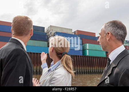 businesswoman explaining about shipping business to her partners, Hamburg, Germany Stock Photo