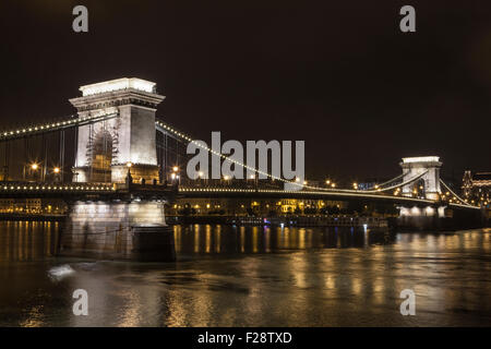 A night-time view of the beautiful Chain Bridge in Budapest, Hungary.
