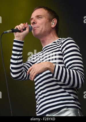 Berlin, Germany. 13th Sep, 2015. Singer Stuart Murdoch of the British indie pop group 'Belle and Sebastian' performs on stage during the Lollapalooza Festival on the grounds of the former Tempelhof airport in Berlin, Germany, 13 September 2015. Photo: Britta Pedersen/dpa/Alamy Live News Stock Photo