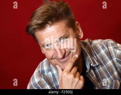 Berlin, Germany. 08th Sep, 2015. Singer Hartmut Engler of German pop band Pur poses for photographs in Berlin, Germany, 08 September 2015. Photo: Britta Pedersen/dpa/Alamy Live News Stock Photo