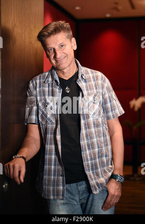 Berlin, Germany. 08th Sep, 2015. Singer Hartmut Engler of German pop band Pur poses for photographs in Berlin, Germany, 08 September 2015. Photo: Britta Pedersen/dpa/Alamy Live News Stock Photo