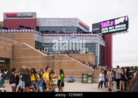 Foxboro, Massachusetts USA - September 12, 2015:  Fans of pop boy band, One Direction gather to await entry to Gillette Stadium, home of New England Patriots in Foxboro, MA for concert on the evening of Saturday, September 12, 2015.  This marks One Direction's final show of their  United States tour. Stock Photo