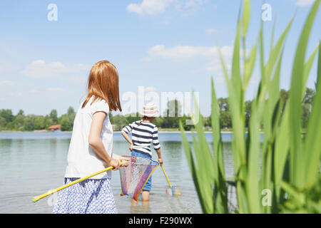 Two friends fishing in the lake, Bavaria, Germany Stock Photo