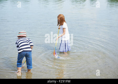 Two friends fishing in a lake, Bavaria, Germany Stock Photo