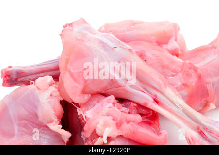 closeup of some pieces of rabbit meat on a white background Stock Photo