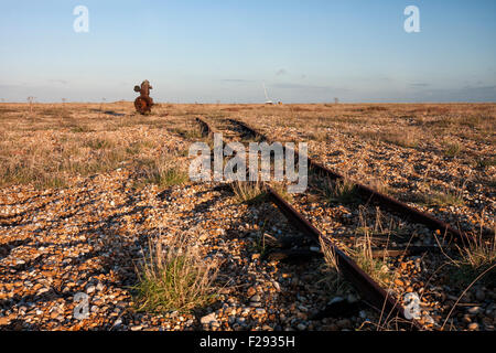 Abandoned old rail track and winch on the shingle beach of Dungeness, Kent, England, UK Stock Photo