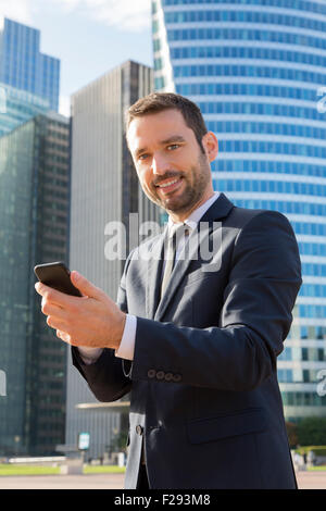 businessman sending a message Stock Photo