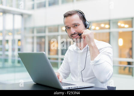 businessman using a headset Stock Photo