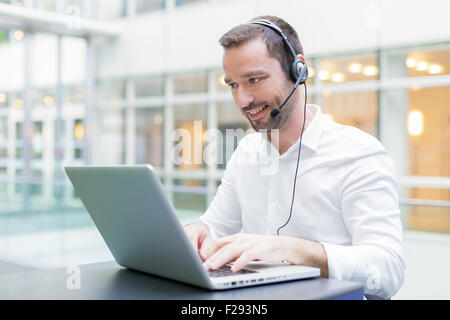 businessman using a headset Stock Photo