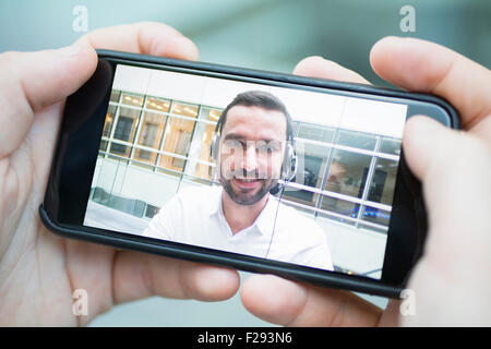 businessman video chatting Stock Photo