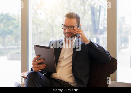 Businessman having a coffee break Stock Photo