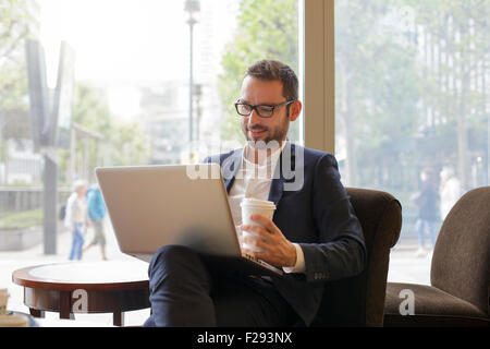 Businessman having a coffee break Stock Photo