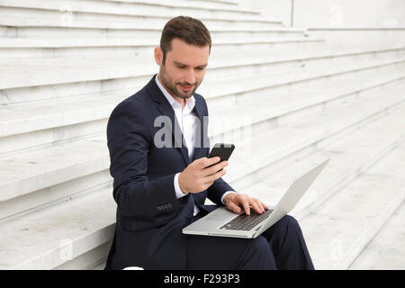 Businessman texting Stock Photo