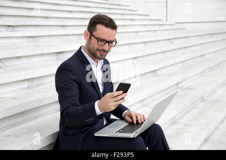 Businessman texting Stock Photo