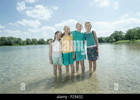 Three small girls standing outside in underwear, rear view, b&w Stock Photo  - Alamy