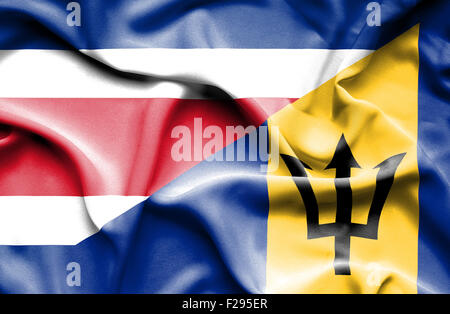 Waving flag of Barbados and Costa Rica Stock Photo