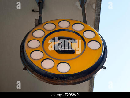Vintage yellow italian telephone sign Stock Photo - Alamy